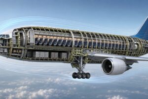 Aircraft fuselage cutaway showing cabin, cargo hold, pressure bulkheads, frames, stringers, and wing attachment structure